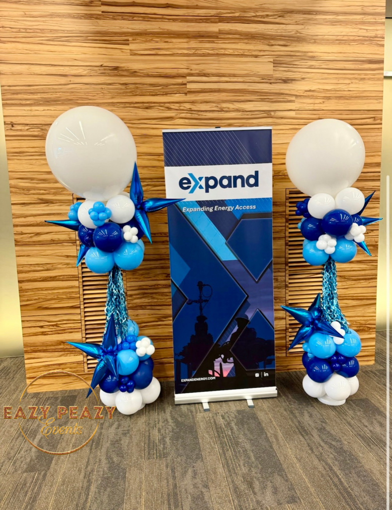 Eazy Peazy Events Houston Tx balloon decor corporate balloon columns grand opening white and blue Balloon Decor